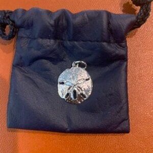 Silver dollar pendant in silver